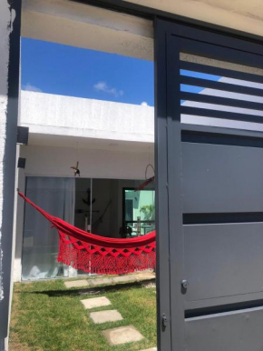 Casa em Arembepe com quatro suítes
